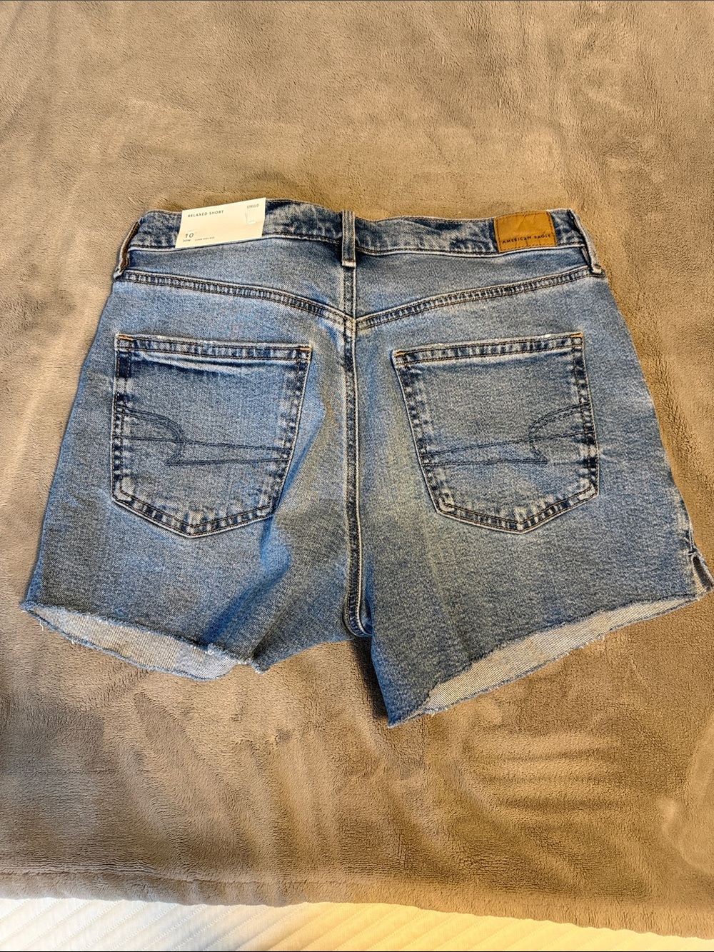 American Eagle Outfitters Light Blue High-Rise Raw Hem Denim Shorts - Picture 2 of 5